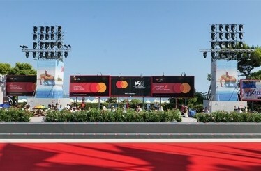Mastercard and Venice Film Festival signboards along the red carpet at Venice Film Festival.